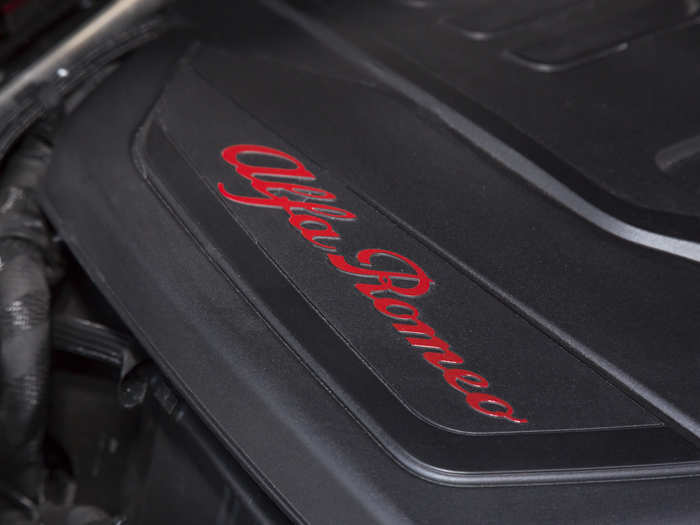 The Alfa Romeo script makes even the homely engine cover look suave.