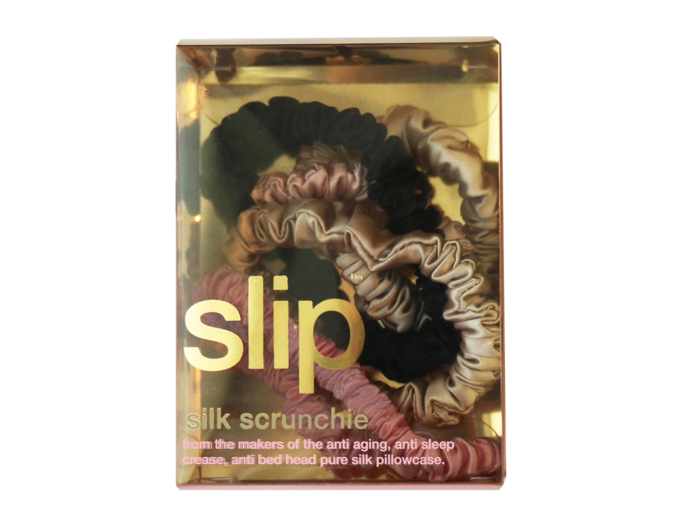 Silk scrunchies to match their pillowcase and eye mask