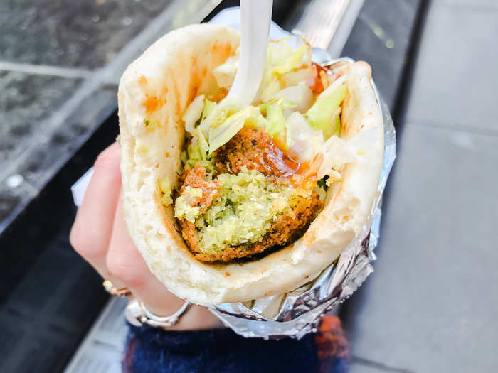 "It all comes down to the plate," Abouelenein told me. So for lunch, I tried the falafel sandwich. It was stuffed with falafel, lettuce, tomato, and it was prepared in under two minutes. The food was hot, flavorful, and delicious.