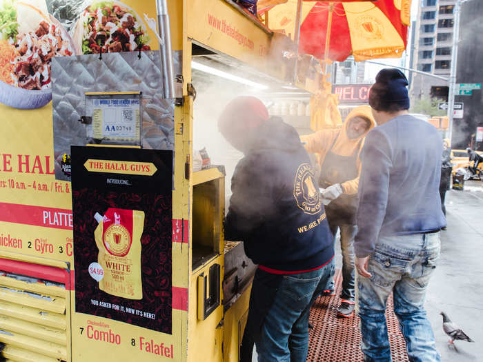 It was cold and rainy out when I was at the cart, but nobody at the cart seemed to mind. If a free moment came up, the cart employees would grab a cup of hot coffee from a food cart down the block and carry on. Everyone remained in good spirits, despite the bad weather.