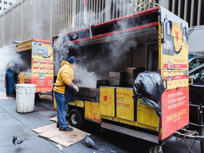 Food was constantly being moved from the vans to grills down the block from the cart. There were big puddles everywhere, and the food had to be carried across the street at rush hour. Still, everything made it to the grills without an issue.