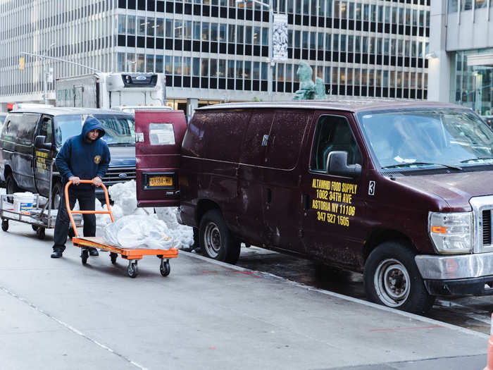 I spent the morning with the team at the original cart, on the corner of 53rd Street and 6th Avenue. Vans carrying the prepared ingredients were parked around the corner from the cart.