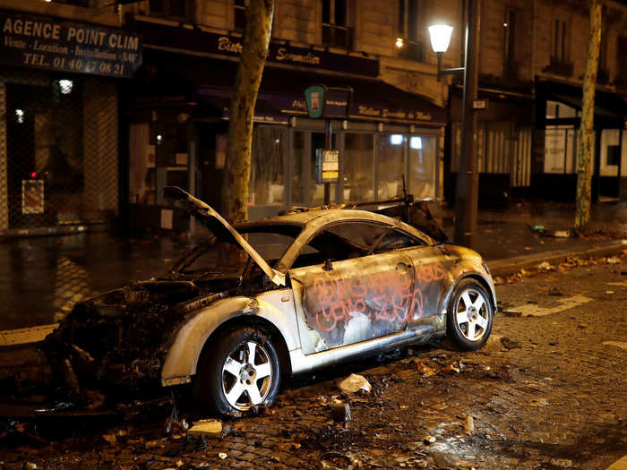 The streets were left lined with vandalized and torched cars.