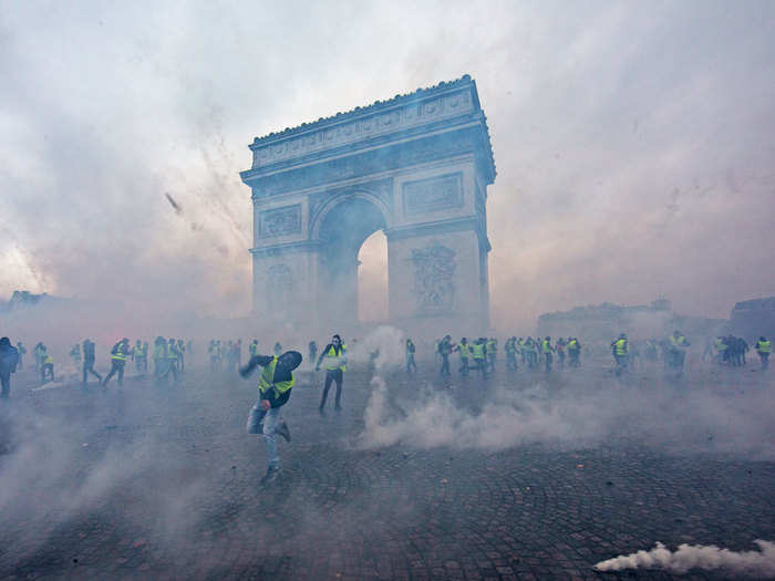 Teargas surrounded protestors as they demonstrated.