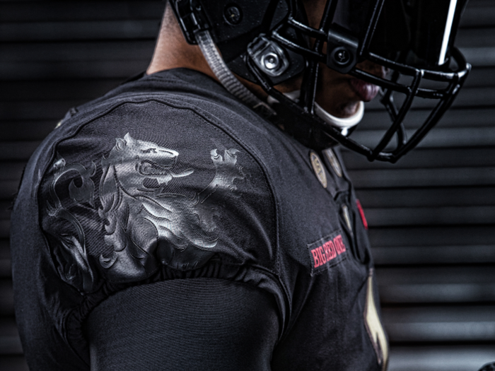 The sleeves of the uniforms honor the "Black Lions of Cantigny."