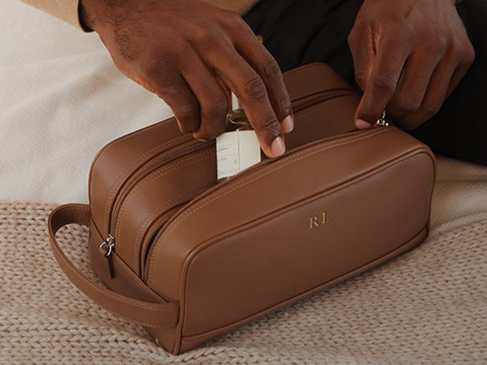 A leather toiletry case they can take with them on trips for years to come