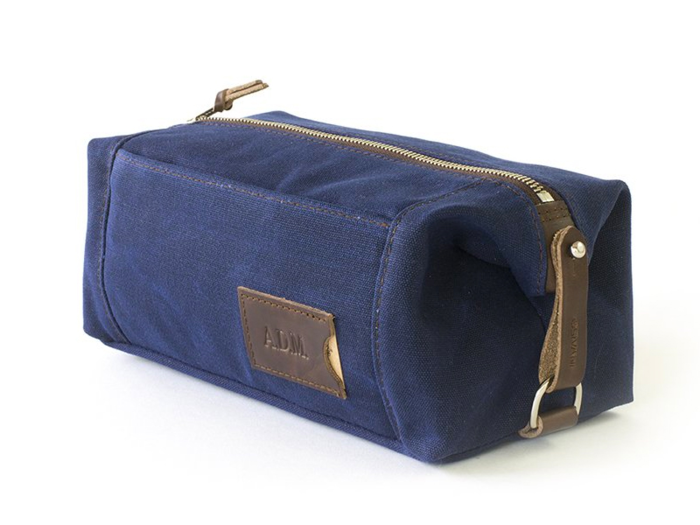 A luxurious waxes canvas and leather toiletry bag