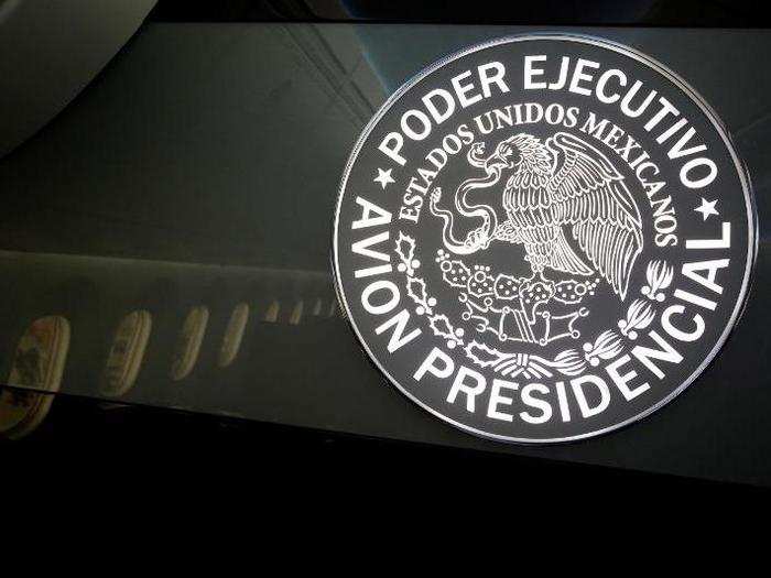 Naturally, the cabin of the jet is emblazed with the Presidential seal.