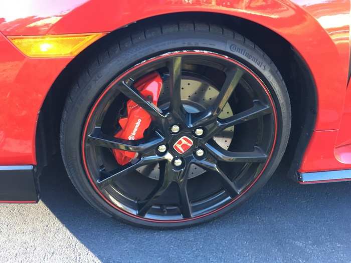 These blacked out performance wheels look amazing. Unfortunately, our test car seems to have taken a beating before it was delivered to us.