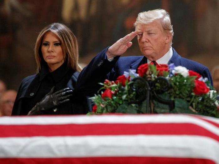 President Donald Trump and First Lady Melania Trump paid their respects to the late president on Monday.