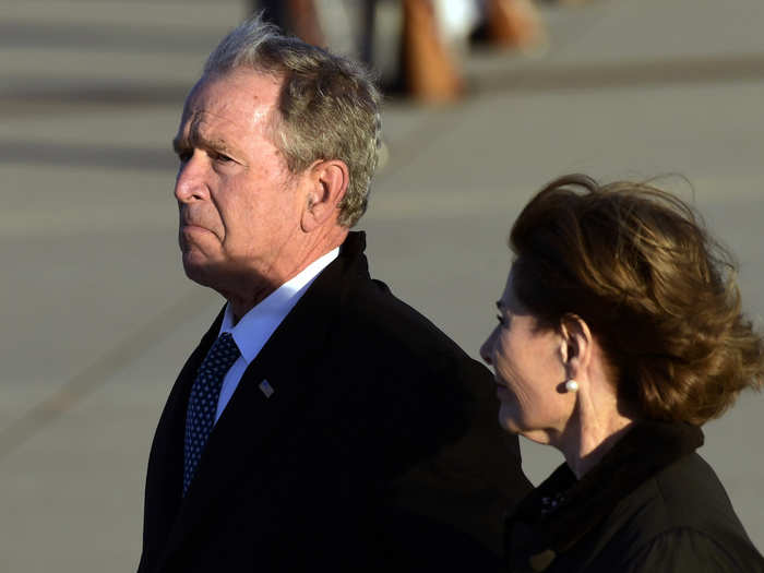 The former president was visibly emotional as he escorted his father