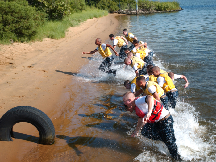 At the Naval Academy, "plebe summer" involves rigorous physical activities, including PT in the surf.