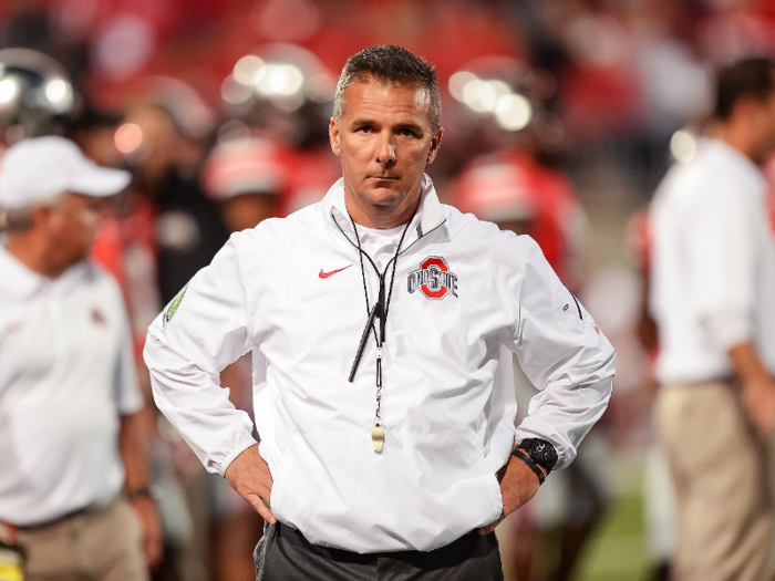 Less than a year after joining ESPN, Meyer was hired as head coach of the Ohio State Buckeyes.