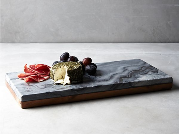 A double-sided cheese board that can also be used for prep