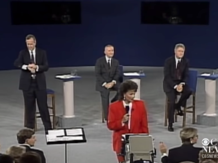 Checking his watch during a debate with Bill Clinton