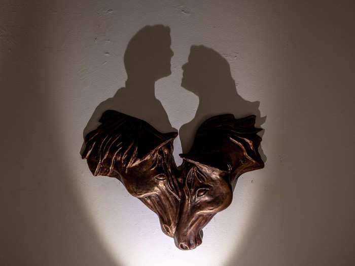 One of my favorite artists was Jordanian couple Maysoon Masalha and Bassam Al Selawi, who create "shadow art" sculptures. The wooden sculptures depict one thing, while the shadow often depicts something entirely different. This sculpture of two horses kissing shows a man and a woman in the shadow.