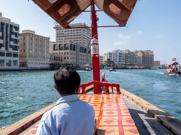 Riding an abra with the wind at your back is one of the most beautiful ways to see Dubai. You can ride all the way to downtown Dubai, but we were only heading across the water to Dubai