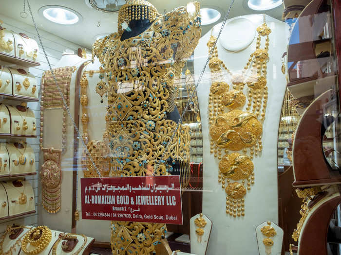 For Indian, Chinese, and Emiratis, gold often functions as part of a dower or "bride price," by which the husband and his family pay the bride and her family for the  marriage. The wedding pieces, like this one, can get incredibly elaborate and cost in the tens and hundreds of thousands of dollars.