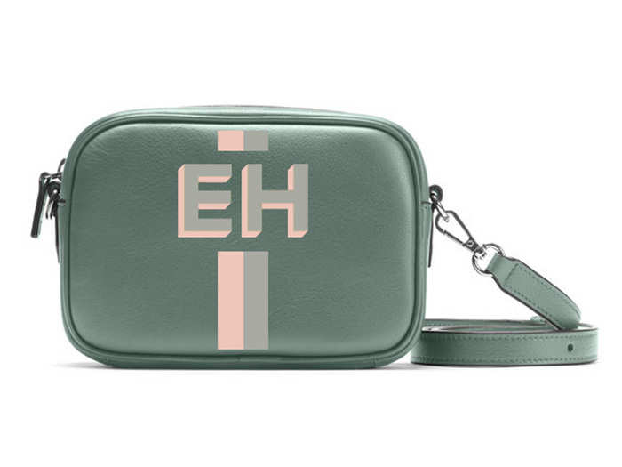 A crossbody bag with a hand-painted monogram