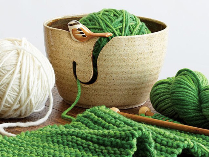 A nice stoneware bowl designed to make knitting more seamless