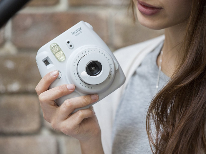 A Polaroid camera for instant snapshots