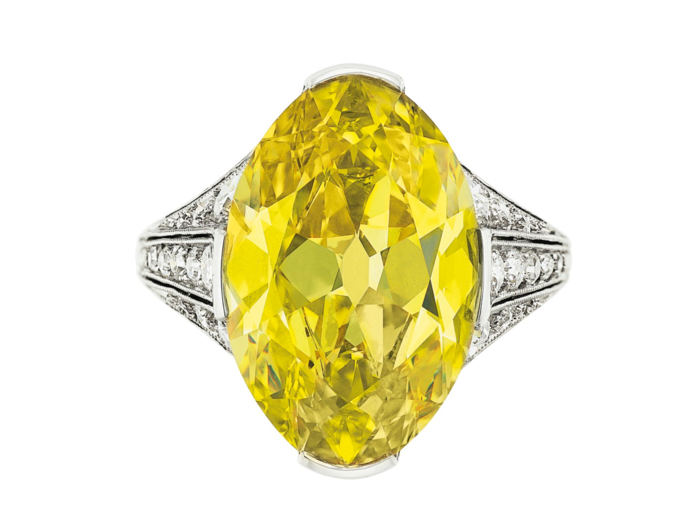 This eye-catching, 8.0 carat oval-cut fancy vivid yellow diamond ring by Gillot & Co. was bought for $1.30 million.