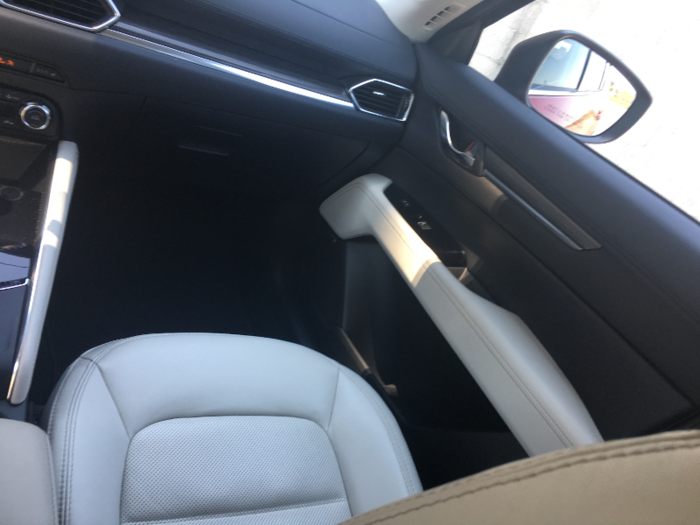I found the white leather-trim seats in our test car to be well bolstered and comfortable, with good adjustability.
