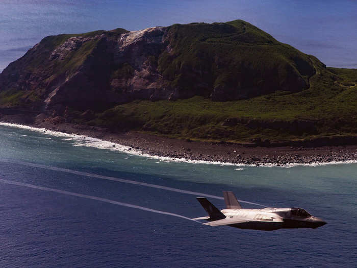 Lt. Col. Richard Rusnok flies an F-35B Lightning II Joint Strike Fighter over Mount Suribachi during Exercise Valiant Shield 18 at Iwo To, Japan on Sep. 18, 2018.