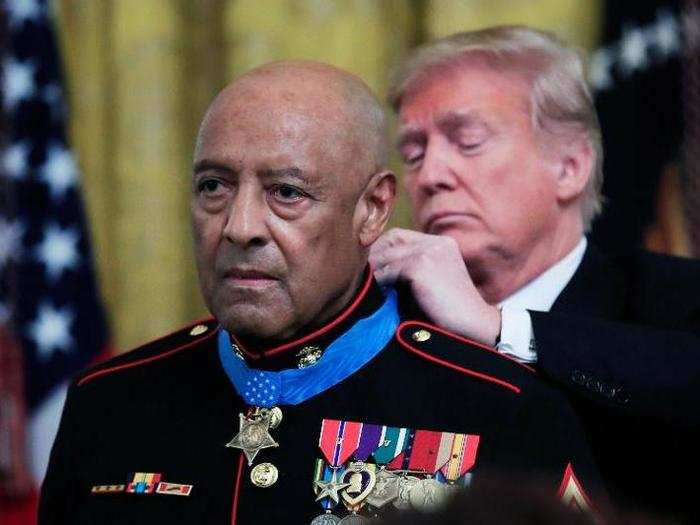 President Donald Trump presents the Medal of Honor to US Marine Corps retired Sgt. Maj. John Canley at the White House in Washington on Oct. 17, 2018.