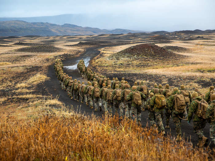 U.S. Marines hike to a cold-weather training site in Iceland during Exercise Trident Juncture 18 on Oct. 19, 2018.