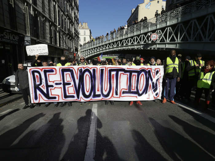 US President Donald Trump has seized on the protests to attack the Paris Climate Agreement, from which he withdrew the US last year.