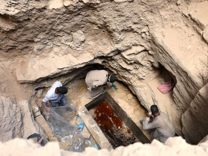 In Egypt, archaeologists opened a 30-ton black sarcophagus and found three skeletons.