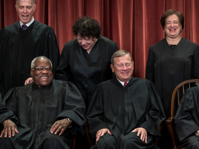 4. Photographers say jokester Justice Clarence Thomas makes it hard to get a good shot because he