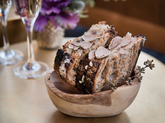 The food menu, created by executive chef Nicolas Caicedo and which Rodov describes as "super high-end bar bites," includes a $70 grilled cheese with white truffle shavings.