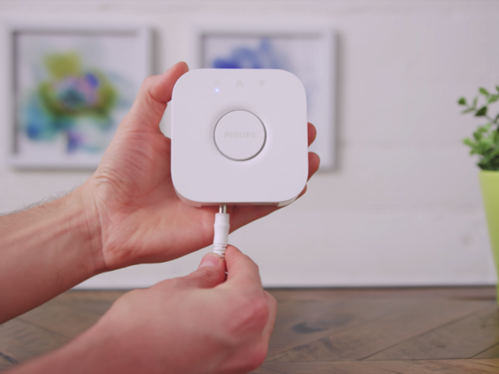 Grab your Philips Hue Bridge, plug it into power, and turn it on.