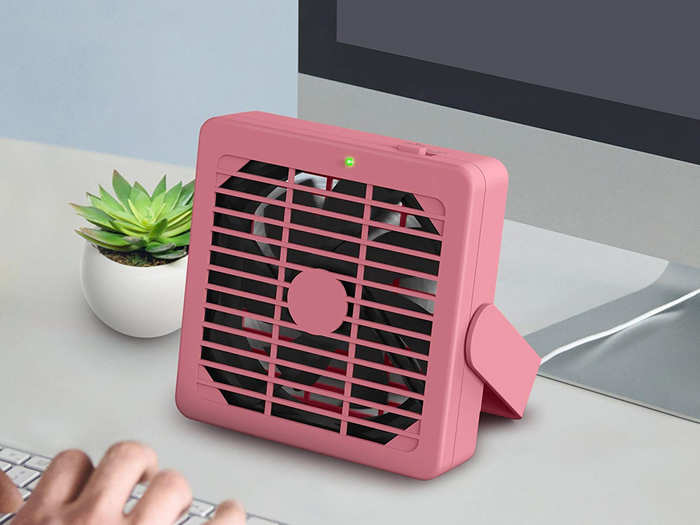 A little fan to deal with their unpredictable office temperatures