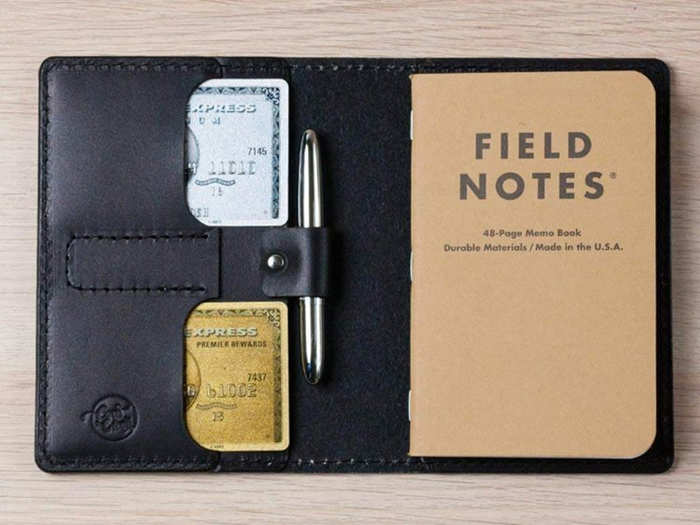 A leather wallet and notebook combo