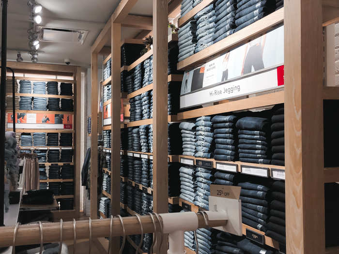 $50 jeans lined the walls of the store. It carried a variety of different sizes and styles.