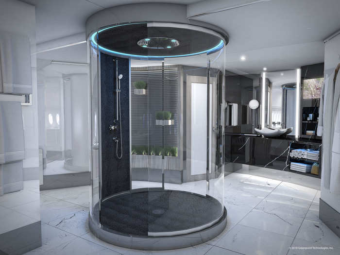 It features a standalone shower and stone floors.