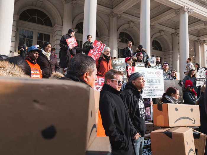 One speaker said, "Amazon Web Services is the backbone of ICE. ICE is targeting Queens communities brutally ... Amazon does not have our best interests at heart."