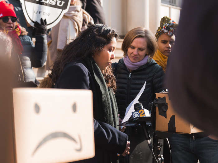 One speaker shared the story of an Amazon Flex driver who, due to his long, unpredictable hours and low pay, was forced to drop out of school and work as many as 14 hours a day so he could afford his home.