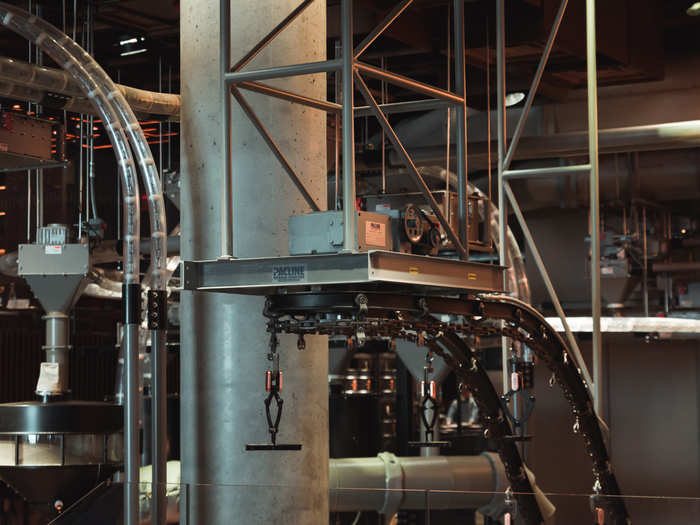 Coffee beans are sent all around the store through a series of tubes that Chief Design Officer Liz Muller told reporters are "inspired by the history of the Meatpacking District."