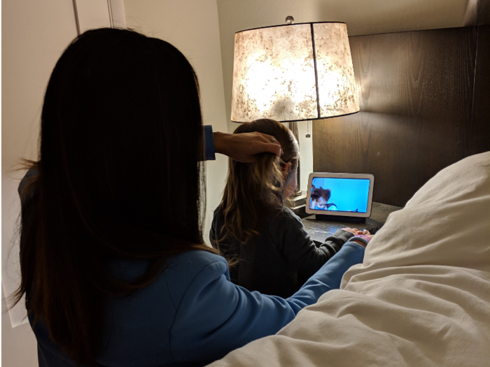 After her children wake up, Rincon helps her daughter get ready. "These days I find myself trying out new hairdos on her," she said.