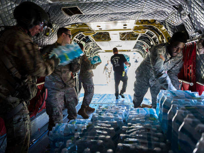 Florida National Guard members deliver various life-saving supplies to affected communities following Hurricane Michael.