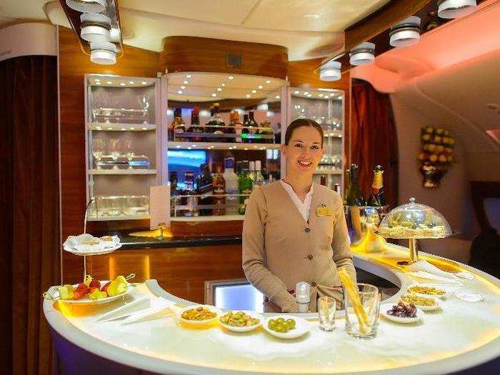 To go one step further, in international first class there is occasionally a bar with olives, crackers, cheese and fruit located at the front of the plane.