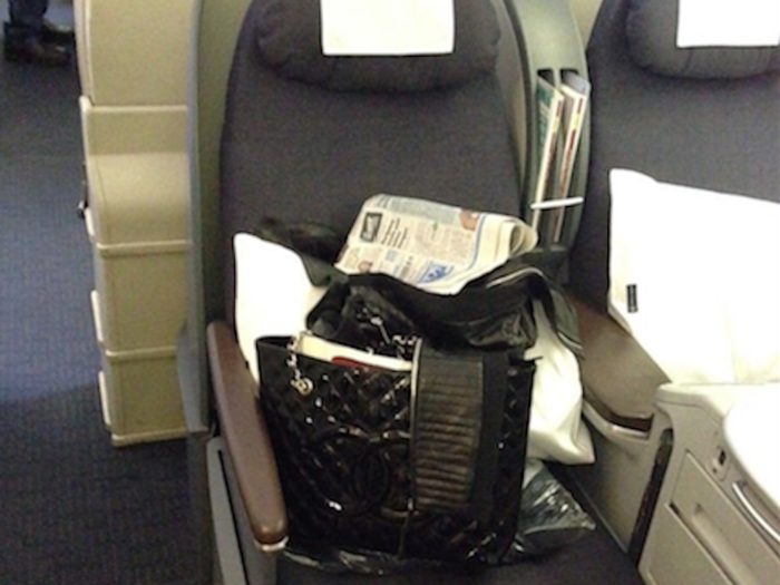 But on domestic first class, your seat may look more like this, with little space to spread out.