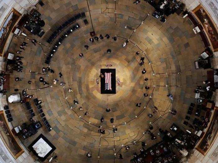 The late Arizona Senator John McCain lies in state in the U.S. Capitol Rotunda.