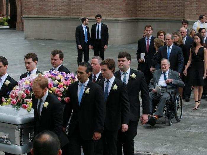 Former U.S. President George H.W. Bush attends the funeral service for his wife, former first lady Barbara Bush, with his son the 43rd U.S. President George W. Bush