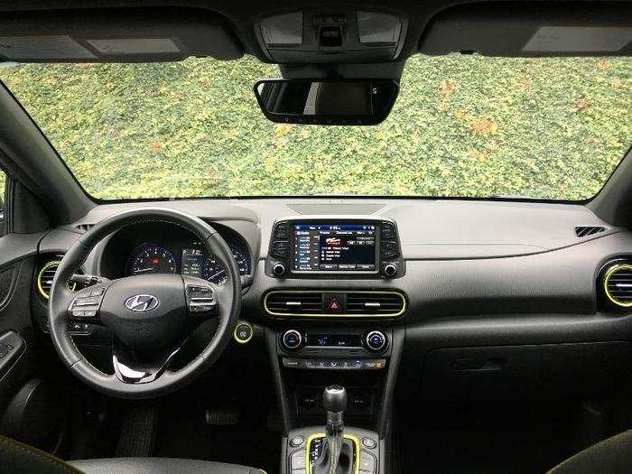 Inside, the Kona is far more conventional. In fact, apart from the lime green accents, it