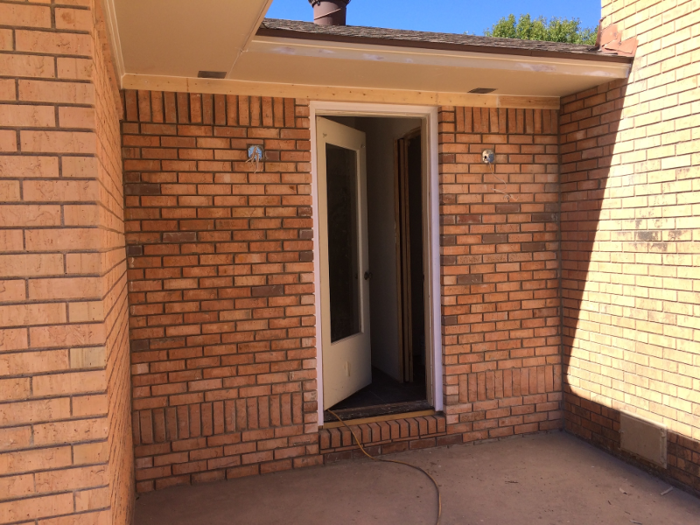 They ended up keeping the original footprint of the home, but added a laundry room and powder bath.